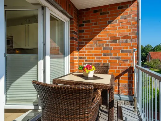 Sheltered balcony with seating